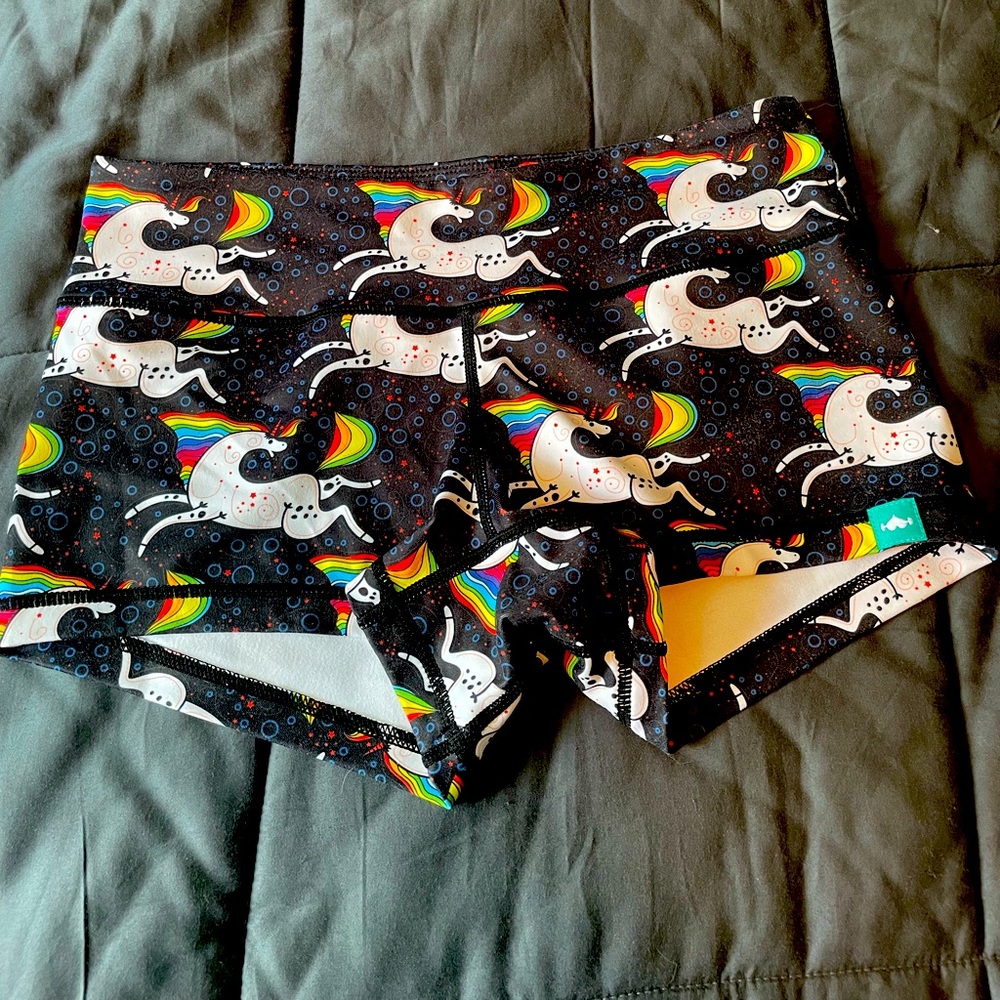 WODBottom CrossFit Shorties in black/rainbow unicorn print. Size small